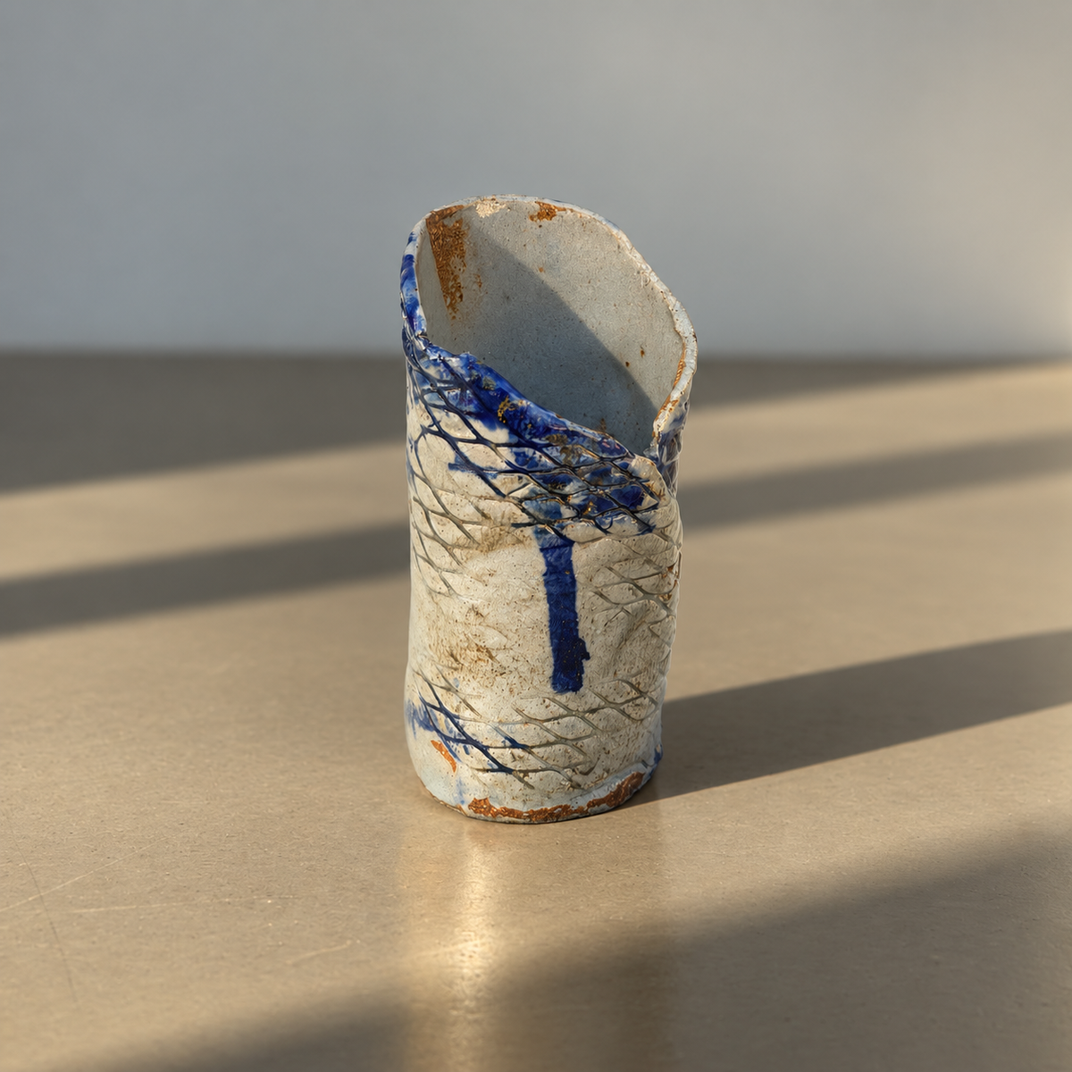 Signed NG studio pottery vase with cobalt blue glaze and incised pattern