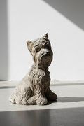 Concrete terrier sculpture with hand-finished textured fur