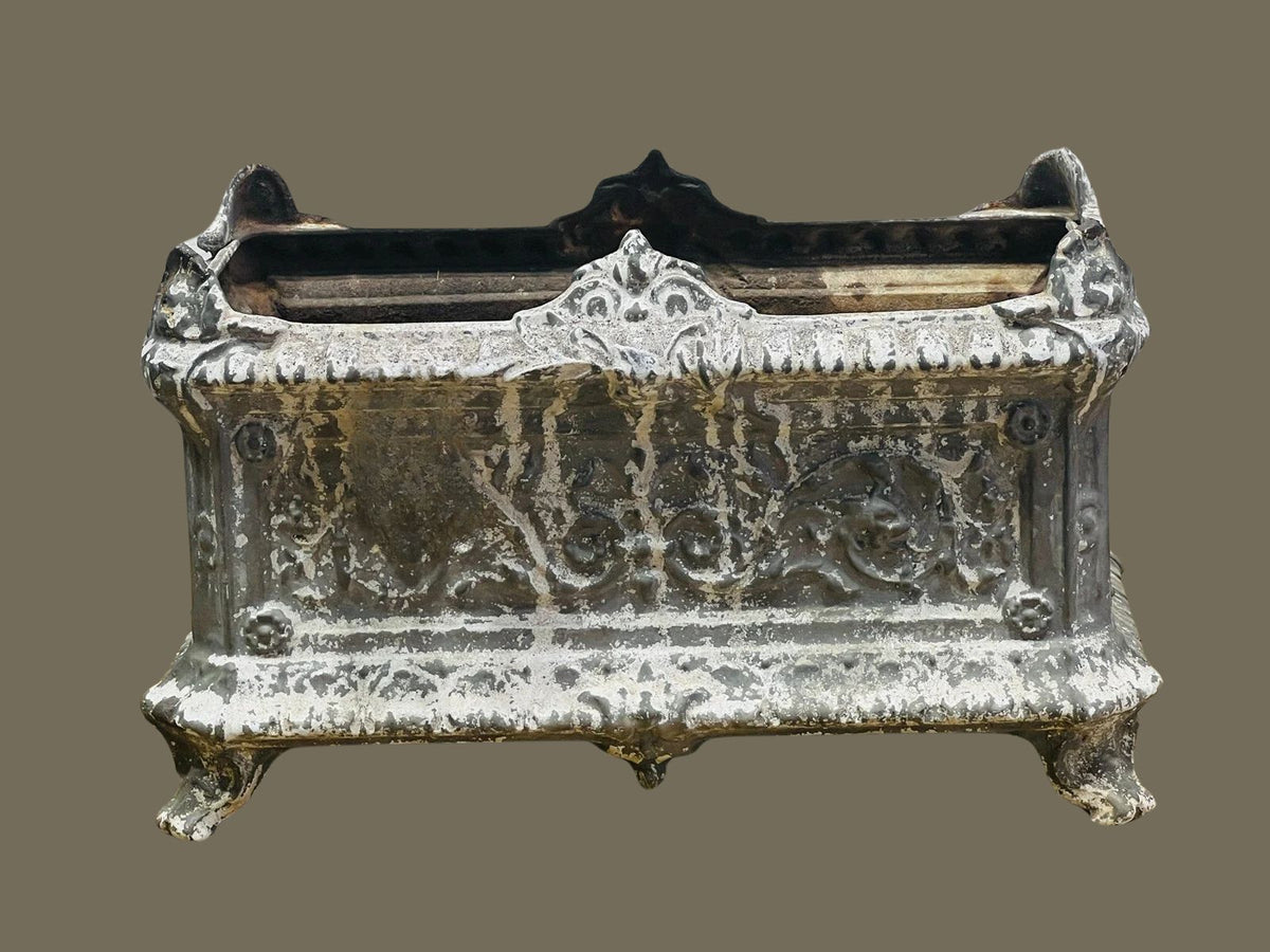 Antique cast iron garden urn planter with French relief ornamentation, weathered patina, and classic proportions for elegant garden display — Hommes and Gardens, Pots + Planters Collection, Landscape Architect, Interior Designer, Outdoor Living, Art, Furniture, Objects, Best Gifts, Nature, Backyard, Yard, Outdoor Decorations, Home Decor, Home Design, Luxury Design.