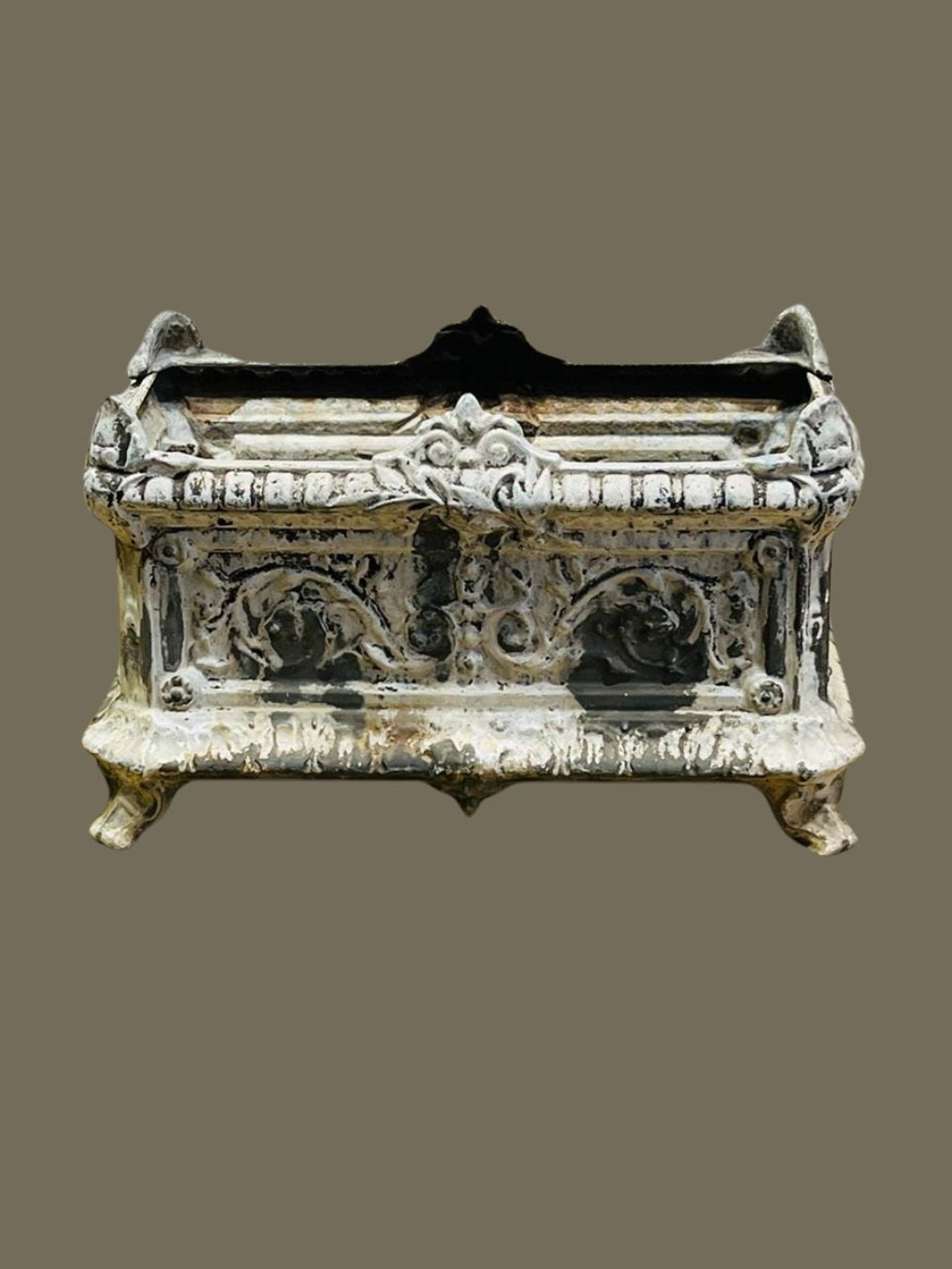 Antique French cast iron garden urn planter with ornate scrolling relief and clawed feet, featuring aged patina and Rococo-style detailing — Hommes and Gardens, Pots + Planters Collection, Landscape Architect, Interior Designer, Outdoor Living, Art, Furniture, Objects, Best Gifts, Nature, Backyard, Yard, Outdoor Decorations, Home Decor, Home Design, Luxury Design.
