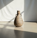 Antique terracotta amphora in Classical Roman style with aged earthen patina, tapered body, and curved handles, a timeless decorative vessel inspired by ancient pottery — Hommes and Gardens, Decorative Collection, Home Decor, Landscape Architect, Interior Designer, Outdoor Living, Outdoor Decorations, Home Design, Luxury Design, Art, Furniture, Objects, Best Gifts, Nature, Backyard, Yard.