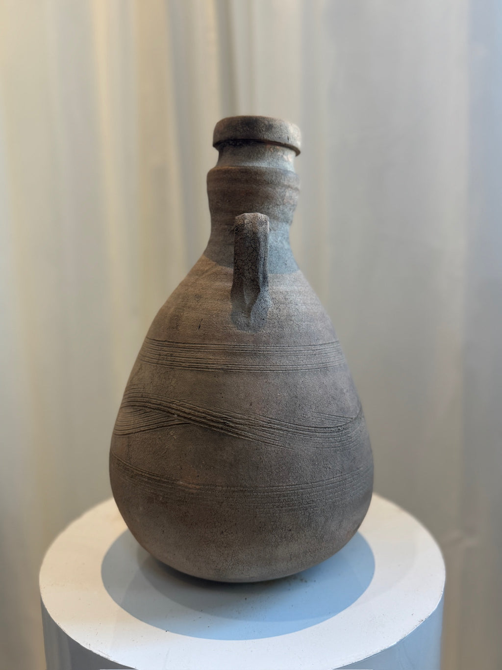 Antique terracotta amphora in Classical Roman style with aged patina, tapered body, and dual handles, handcrafted pottery reflecting ancient artistry — Hommes and Gardens, Vases + Vessels Collection, Landscape Architect, Interior Designer, Outdoor Living, Art, Furniture, Objects, Best Gifts, Nature, Backyard, Yard, Outdoor Decorations, Home Decor, Home Design, Luxury Design.