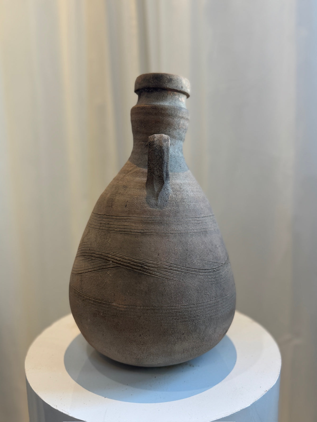 Antique terracotta amphora in Classical Roman style with aged patina, tapered body, and dual handles, handcrafted pottery reflecting ancient artistry — Hommes and Gardens, Vases + Vessels Collection, Landscape Architect, Interior Designer, Outdoor Living, Art, Furniture, Objects, Best Gifts, Nature, Backyard, Yard, Outdoor Decorations, Home Decor, Home Design, Luxury Design.