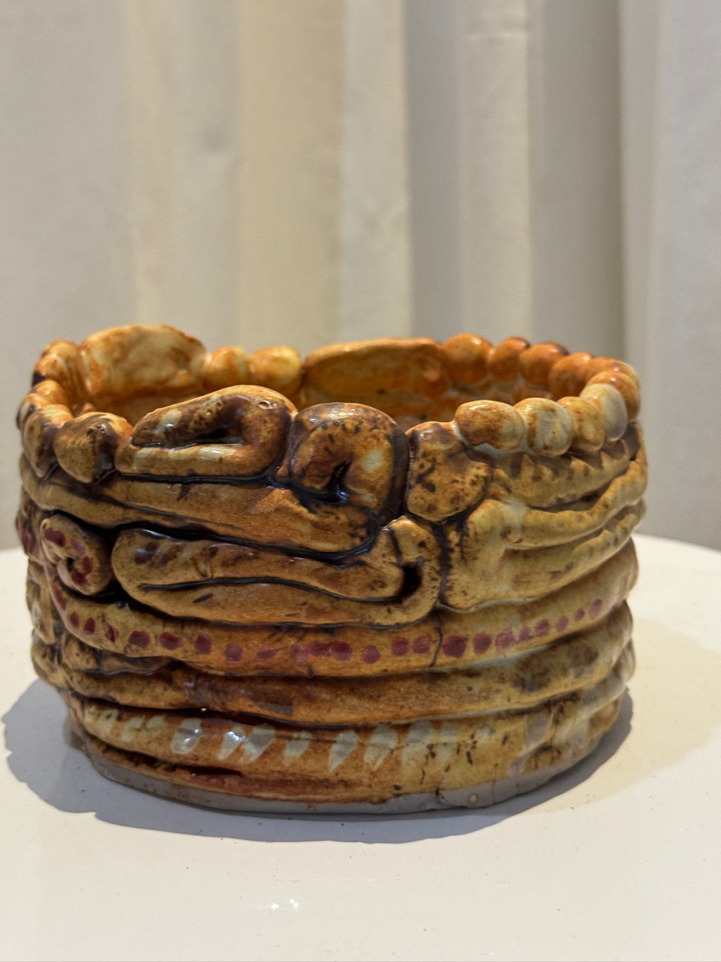 Artisan handcrafted clay swirl ceramic vessel with sculptural form and layered texture, finished in earthy brown, amber, and burgundy glaze — Hommes and Gardens, Vases Collection, Landscape Architect, Interior Designer, Outdoor Living, Art, Furniture, Objects, Best Gifts, Nature, Backyard, Yard, Outdoor Decorations, Home Decor, Home Design, Luxury Design.