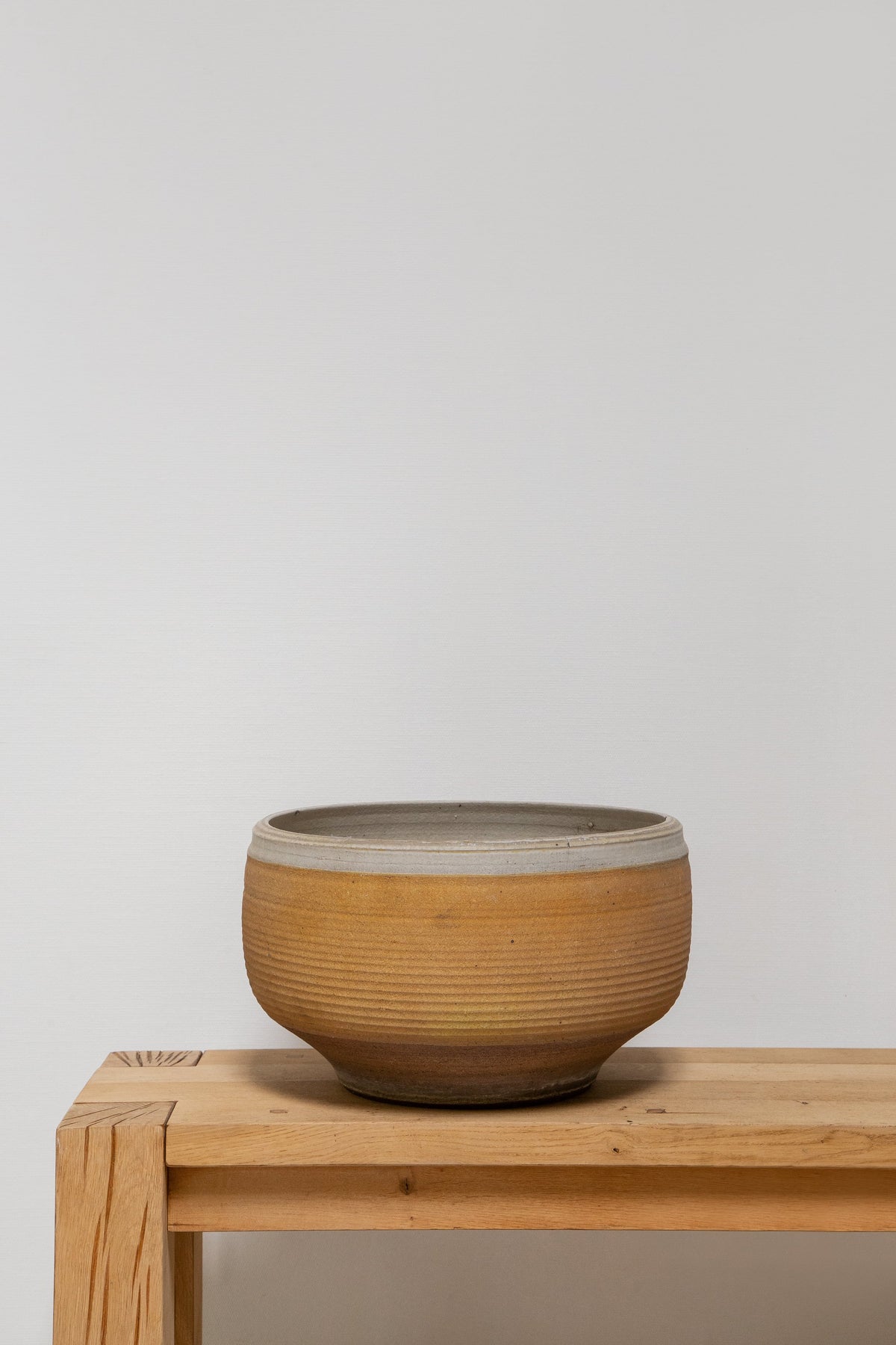 Bob Kinzie mid-century ribbed stoneware pot, hand-thrown ceramic planter with earthy terracotta tones and refined organic texture — Hommes and Gardens, Pots + Vessels Collection, Landscape Architect, Interior Designer, Outdoor Living, Outdoor Decorations, Home Decor, Home Design, Luxury Design, Art, Furniture, Objects, Best Gifts, Nature, Backyard, Yard.
