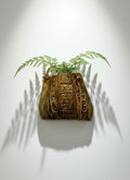 Decorative Ceramic Handbag Wall Sculpture with Leather Strap showcasing lush ferns, artisan craftsmanship. hommes + gardens estudio.