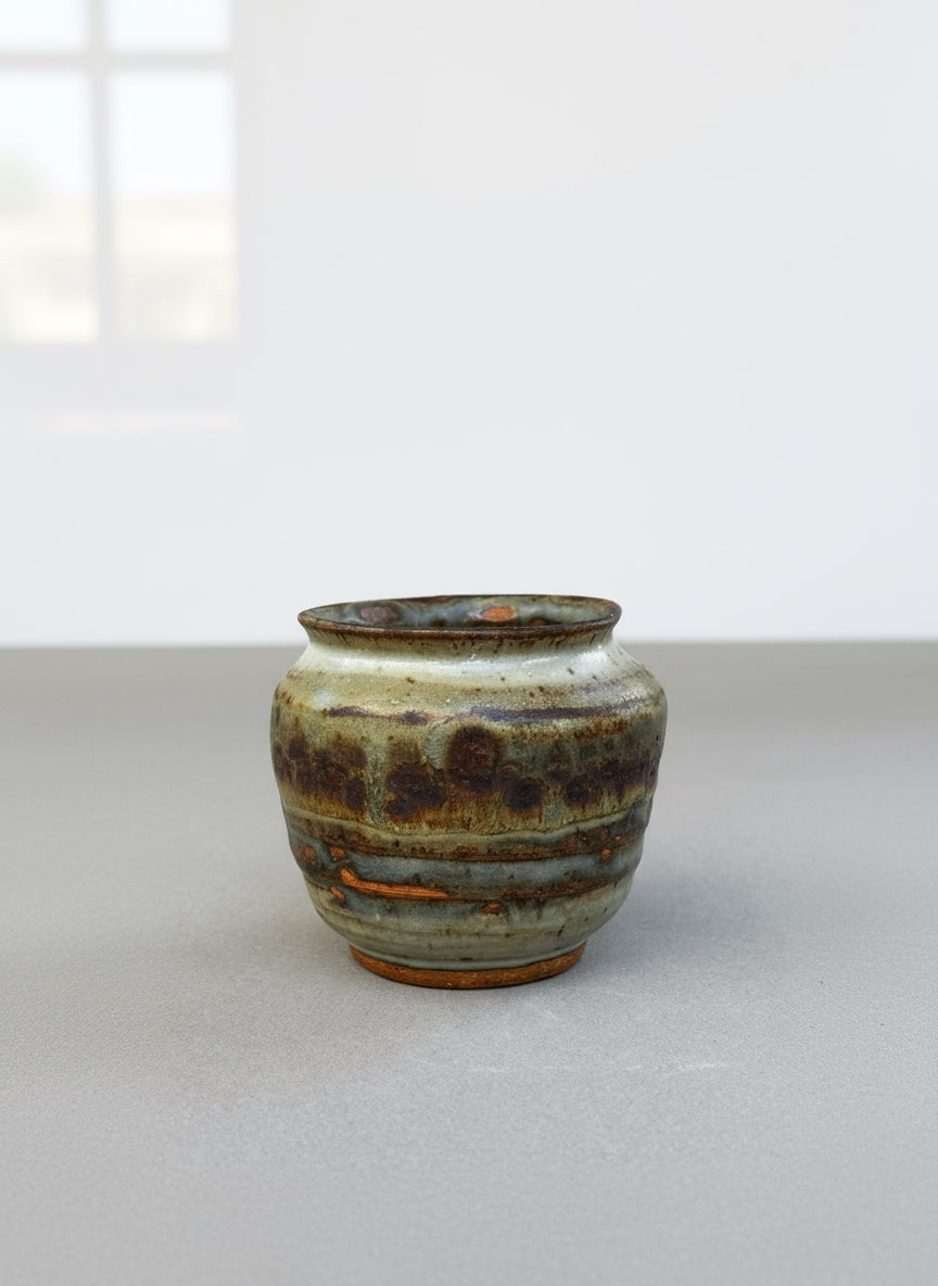 hand-thrown studio pottery urn vase with brown gray terracotta tones
