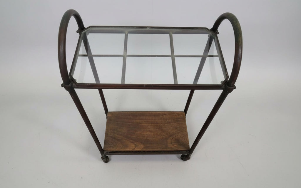 Antique Industrial Copper & Glass Entryway Stand with Wooden Shelf showcasing elegant design and functional storage. hommes + gardens estudio.