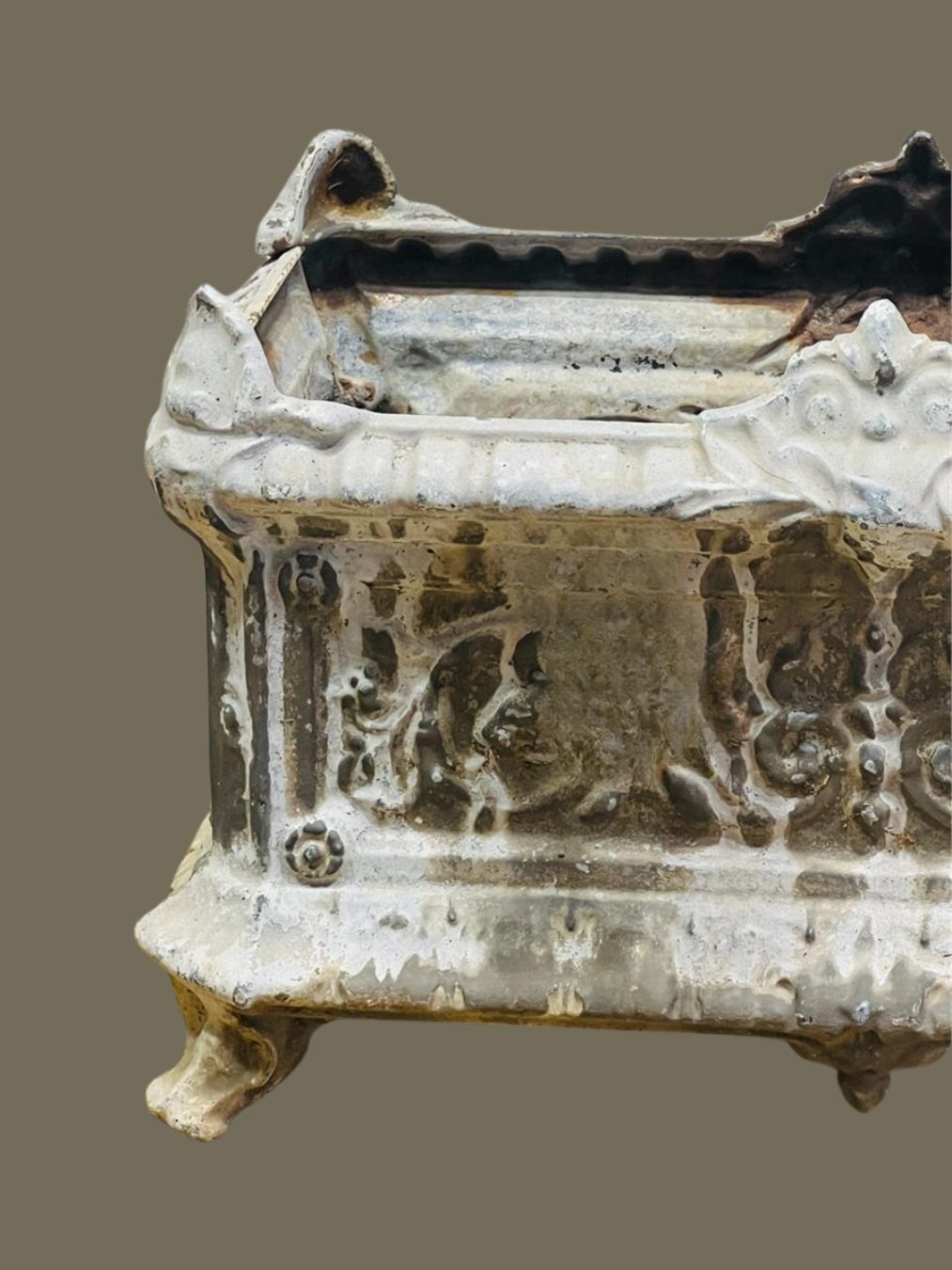 French antique cast iron urn planter featuring intricate relief foliage design, aged patina, and decorative clawed feet for classic European appeal — Hommes and Gardens, Pots + Planters Collection, Landscape Architect, Interior Designer, Outdoor Living, Art, Furniture, Objects, Best Gifts, Nature, Backyard, Yard, Outdoor Decorations, Home Decor, Home Design, Luxury Design.