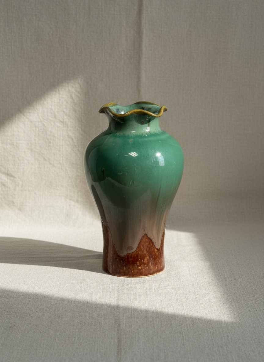 Handmade ceramic vase featuring a unique drip glaze finish and ruffled rim, an artisanal mid-century-inspired pottery piece perfect for elegant floral or decorative display — Hommes and Gardens, Pots & Vessels Collection, Home Decor, Outdoor Decorations, Landscape Architect, Interior Designer, Outdoor Living, Home Design, Luxury Design, Art, Furniture, Objects, Best Gifts, Nature, Backyard, Yard.