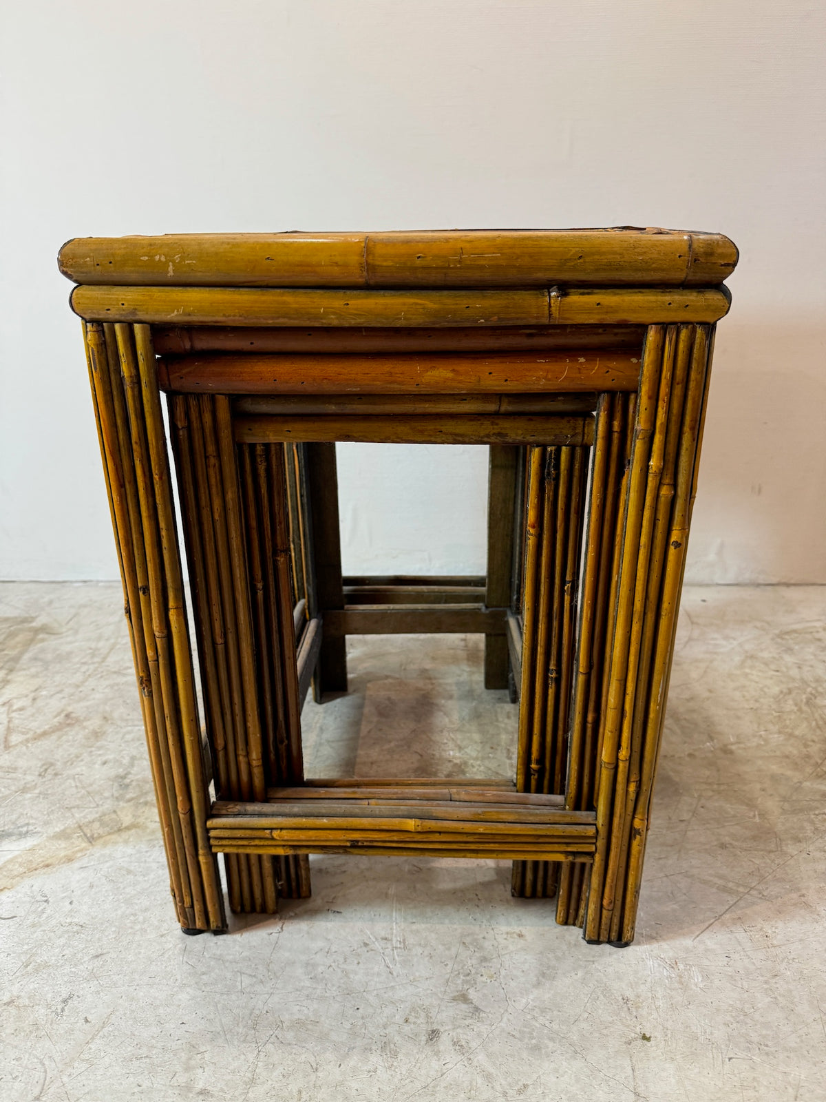 Mid-century bamboo and rattan nesting side tables with tropical boho charm, handwoven design and natural honey finish — Hommes and Gardens, Furniture Collection, Landscape Architect, Interior Designer, Outdoor Living, Art, Furniture, Objects, Best Gifts, Nature, Backyard, Yard, Outdoor Decorations, Home Decor, Home Design, Luxury Design.