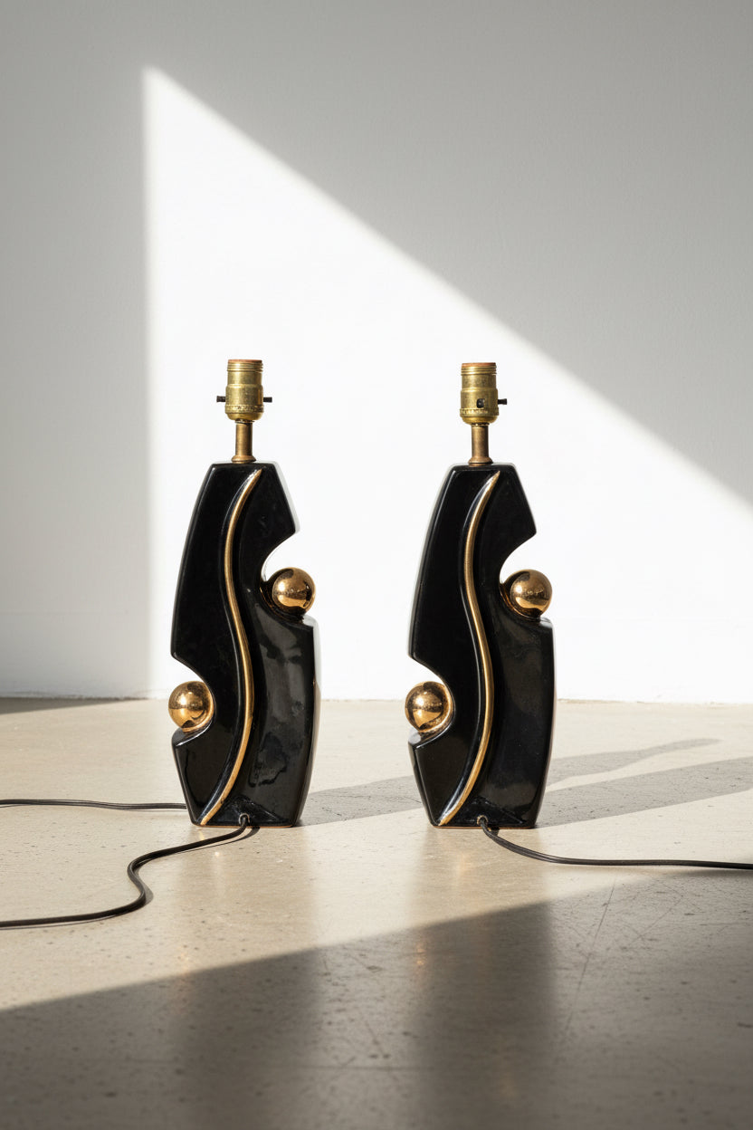Pair of Mid-Century Modern Glazed Pottery Table Lamps featuring a stylish black and gold design, hommes + gardens estudio.