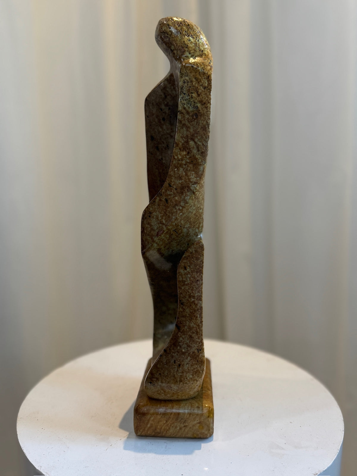 Mid-Century soapstone abstract sculpture by Marco Lyra, fluid human-inspired design with warm tones and smooth sculptural base — Hommes and Gardens, Objects Collection, Landscape Architect, Interior Designer, Outdoor Living, Art, Furniture, Objects, Best Gifts, Nature, Backyard, Yard, Outdoor Decorations, Home Decor, Home Design, Luxury Design.