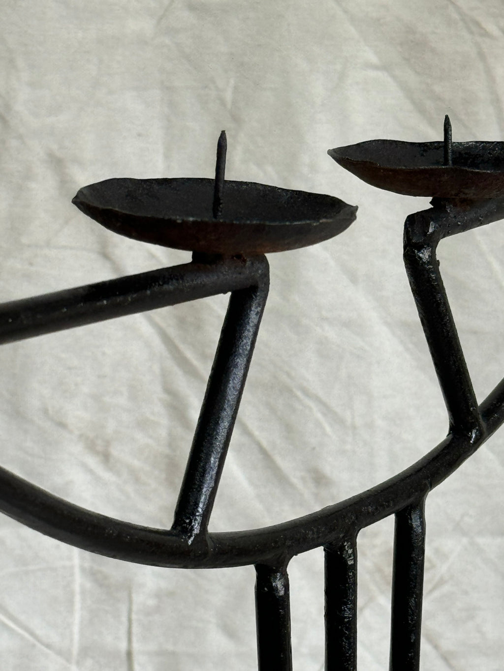Close-up of the Vintage Art Nouveau Wrought Iron Candle Holder showcasing the unique design and candle cups. hommes + gardens estudio.