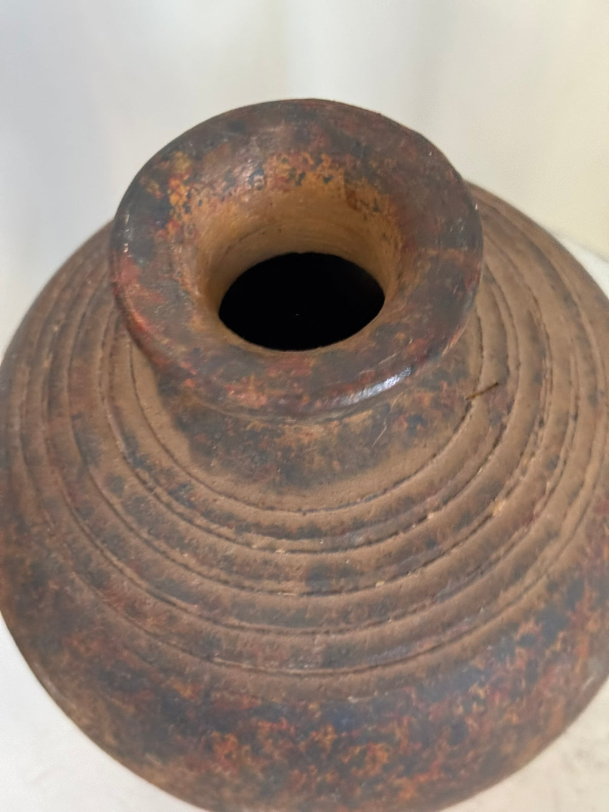 Primitive handcrafted studio pottery vase with rustic aged patina, rounded body and flared rim, embodying timeless wabi-sabi elegance — Hommes and Gardens, Vases + Vessels Collection, Landscape Architect, Interior Designer, Outdoor Living, Art, Furniture, Objects, Best Gifts, Nature, Backyard, Yard, Outdoor Decorations, Home Decor, Home Design, Luxury Design.