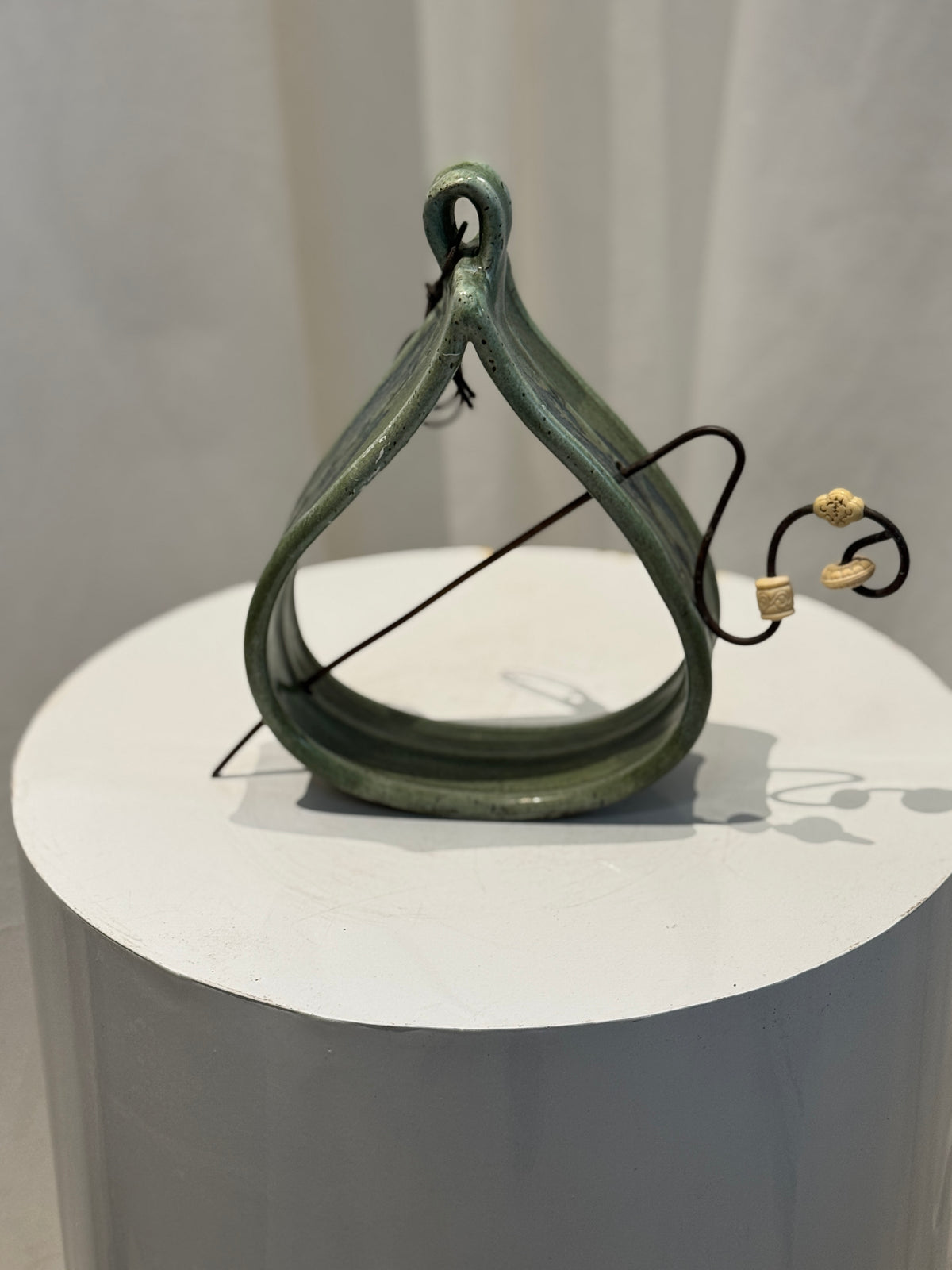 Signature J.S. hanging decor piece with rod, handcrafted ceramic wall planter featuring rich green glaze and elegant curved shape, perfect for artistic interiors — Hommes and Gardens, Objects Collection, Landscape Architect, Interior Designer, Outdoor Living, Art, Furniture, Objects, Best Gifts, Nature, Backyard, Yard, Outdoor Decorations, Home Decor, Home Design, Luxury Design.