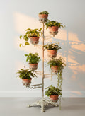 Victorian cast iron revolving arm plant stand with ornate Rococo detailing, ten scalloped holders, and distressed white patina, a versatile antique display for plants or candles — Hommes and Gardens, Pots + Vessels Collection, Home Decor, Landscape Architect, Interior Designer, Outdoor Living, Outdoor Decorations, Home Design, Luxury Design, Art, Furniture, Objects, Best Gifts, Nature, Backyard, Yard.