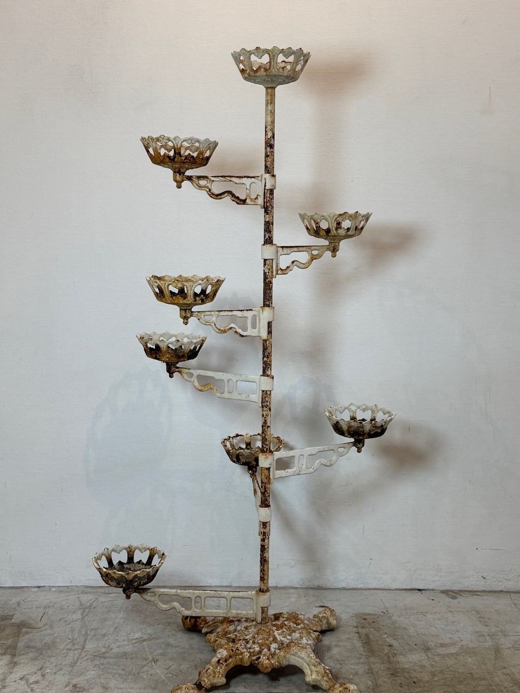 Victorian cast iron revolving arm plant stand with ornate Rococo motifs, distressed white patina, and ten floral holders for plants or candles — Hommes and Gardens, Pots + Planters Collection, Landscape Architect, Interior Designer, Outdoor Living, Art, Furniture, Objects, Best Gifts, Nature, Backyard, Yard, Outdoor Decorations, Home Decor, Home Design, Luxury Design.