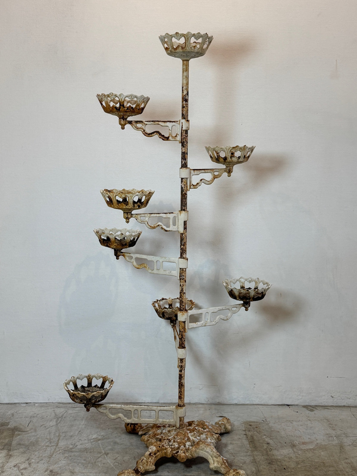 Victorian cast iron revolving arm plant stand with ornate Rococo motifs, distressed white patina, and ten floral holders for plants or candles — Hommes and Gardens, Pots + Planters Collection, Landscape Architect, Interior Designer, Outdoor Living, Art, Furniture, Objects, Best Gifts, Nature, Backyard, Yard, Outdoor Decorations, Home Decor, Home Design, Luxury Design.