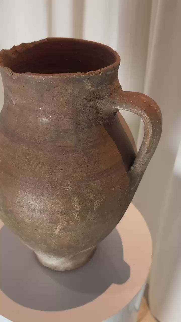 Antique European terracotta pot, handcrafted clay vessel with amphora shape and textured finish, aged patina reflecting centuries-old pottery craft — Hommes and Gardens, Pots + Planters Collection, Landscape Architect, Interior Designer, Outdoor Living, Art, Furniture, Objects, Best Gifts, Nature, Backyard, Yard, Outdoor Decorations, Home Decor, Home Design, Luxury Design.