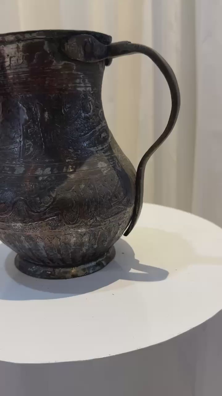 Hand-engraved antique copper pitcher with Arabic inscriptions and ornate detailing, featuring aged patina and elegant curved form, collectible Islamic metalwork — Hommes and Gardens, Culinaria Collection, Landscape Architect, Interior Designer, Outdoor Living, Art, Furniture, Objects, Best Gifts, Nature, Backyard, Yard, Outdoor Decorations, Home Decor, Home Design, Luxury Design.